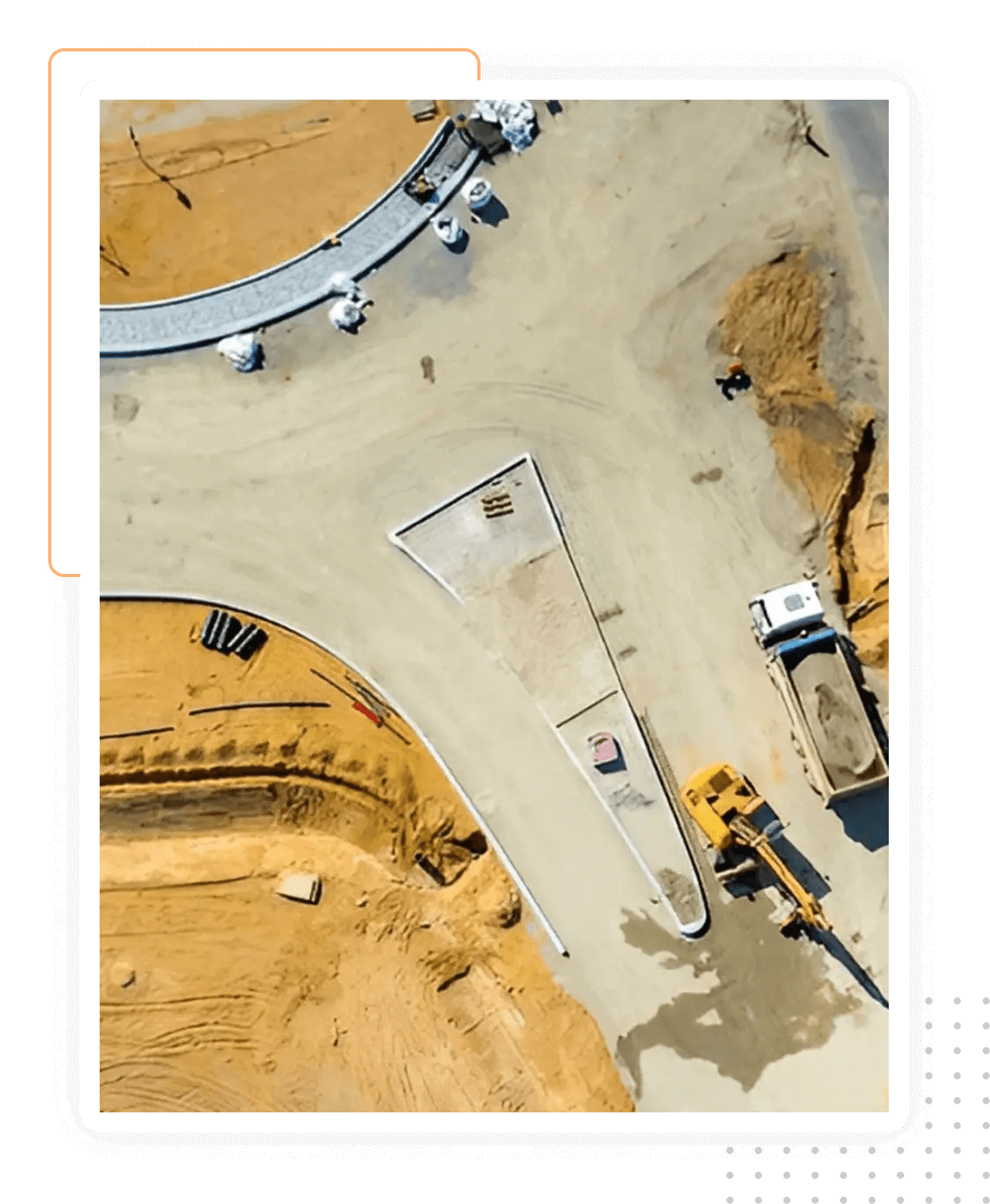 A construction site with trucks and equipment on it.