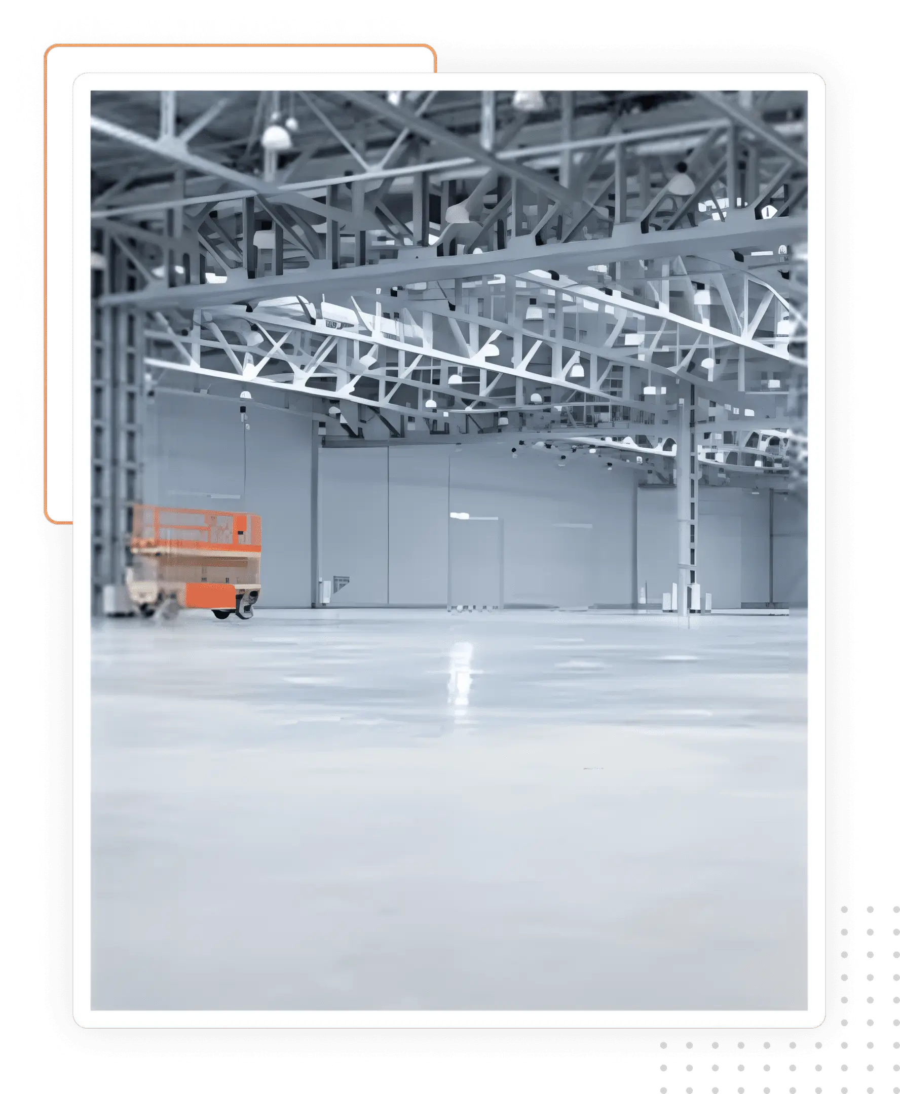 A large warehouse with a forklift in the middle of it.